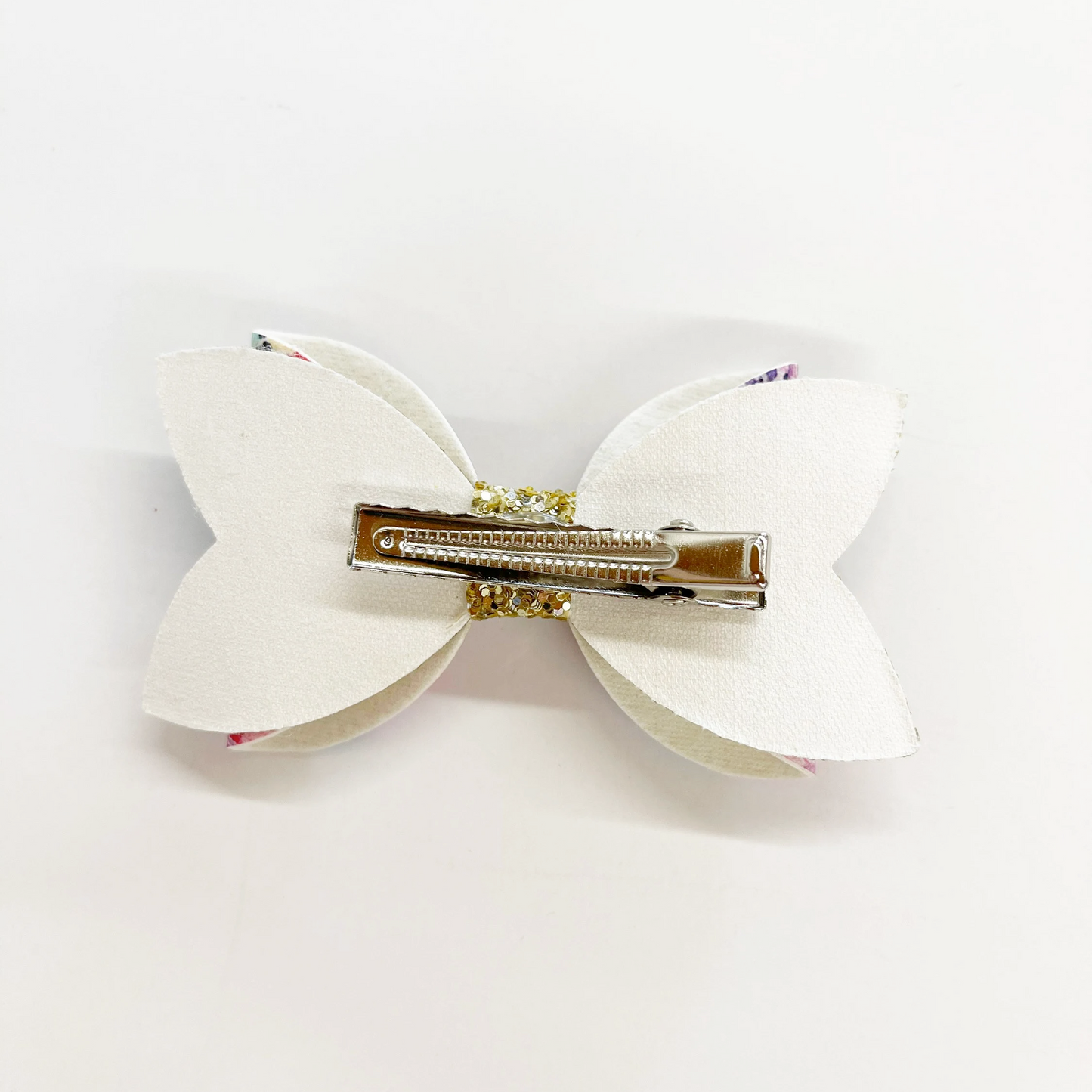 3.5” Glitter Floral Faux Leather Bow