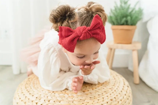 Girl Wearing Red Thick Sweater Knit Headbands - Golden Dot Lane