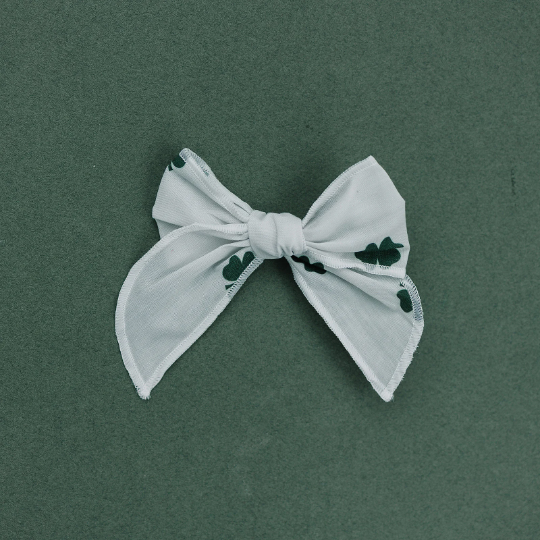 Four Leaf Clover Ivory Serged Cotton Bow