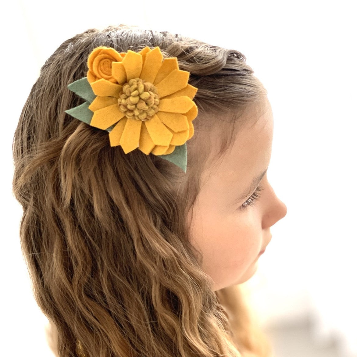 Girl Wearing Mustard Whimsy Floral - Golden Dot Lane