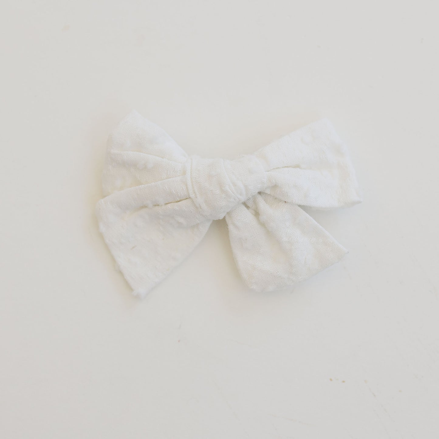 Timeless White Cotton Swiss Dot Bow