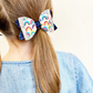 3.5” Rainbows Glitter Faux Leather Bow